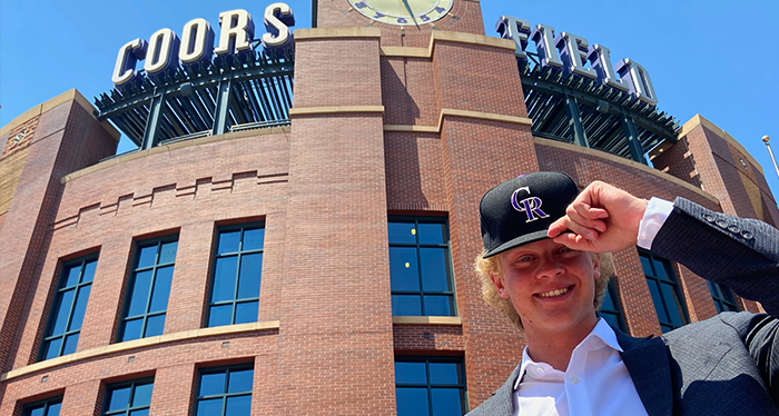 Case Williams is pictured outside of Denver’s Coors Field, the home field of the Colorado Rockies. 