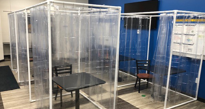 Plastic barriers help stop the spread of respiratory droplets, which is the primary mode of transmission for COVID-19, according to the CDC. 